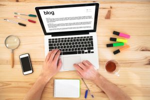 blog, top view of hands and keyboard